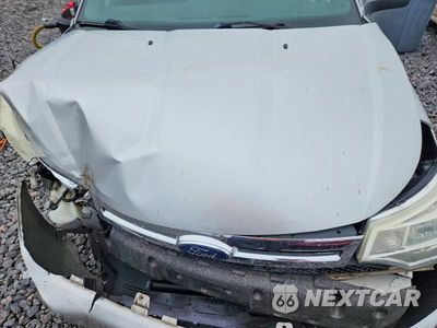 Zdjęcie 11 z 12 samochodu: 2009 FORD FOCUS SES VIN:1FAHP36N69W249597 - miniatura