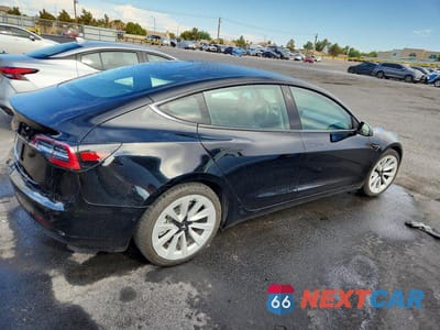 Trzecie zdjęcie samochodu z tyłu: 2022 TESLA MODEL 3 VIN:5YJ3E1EA8NF285674 - miniatura