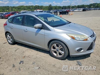 Czwarte zdjęcie samochodu z boku: 2014 FORD FOCUS VIN:1FADP3K21EL399266 - miniatura