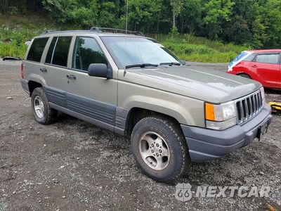 Czwarte zdjęcie samochodu z boku: 1996 JEEP GRAND CHEROKEE LAREDO VIN:1J4GZ58S9TC200444 - miniatura