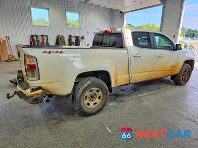 Trzecie zdjęcie samochodu z tyłu: 2017 CHEVROLET COLORADO LT VIN:1GCGTCEN3H1164103 - miniatura