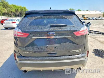 Zdjęcie 6 z 12 samochodu: 2019 FORD EDGE TITANIUM VIN:2FMPK3K94KBB63138 - miniatura