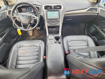 Zdjęcie 8 z 12 samochodu: 2018 FORD FUSION SE VIN:3FA6P0HD0JR135693 - miniatura