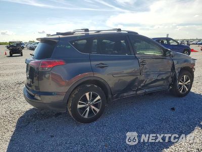 Trzecie zdjęcie samochodu z tyłu: 2018 TOYOTA RAV4 XLE VIN:JTMWFREV9JJ741423 - miniatura