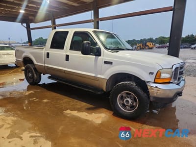 Czwarte zdjęcie samochodu z boku: 2001 FORD F250 SUPER DUTY VIN:1FTNW21LX1EB00023 - miniatura