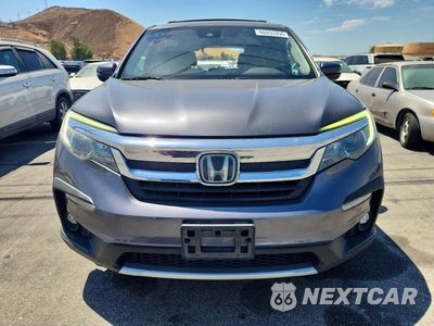 Piąte zdjęcie samochodu w środku: 2020 HONDA PILOT EXL VIN:5FNYF5H59LB022843 - miniatura