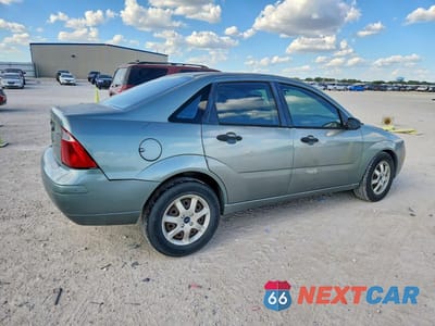 Trzecie zdjęcie samochodu z tyłu: 2005 FORD FOCUS ZX4 VIN:1FAFP34NX5W272448 - miniatura