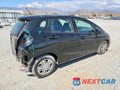 Trzecie zdjęcie samochodu z tyłu: 2018 HONDA FIT LX VIN:3HGGK5H44JM735349 - miniatura