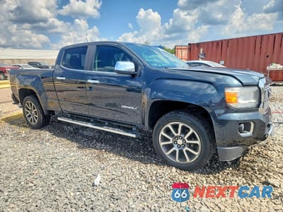 Czwarte zdjęcie samochodu z boku: 2017 GMC CANYON DENALI VIN:1GTG6EEN4H1241905 - miniatura