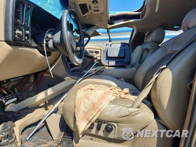 Zdjęcie 7 z 13 samochodu: 2001 CHEVROLET TAHOE K1500 VIN:1GNEK13T21J100373 - miniatura