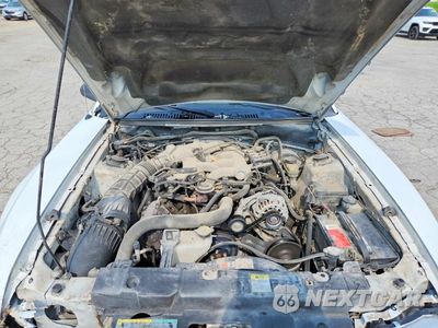 Zdjęcie 11 z 12 samochodu: 2004 FORD MUSTANG VIN:1FAFP40644F150011 - miniatura
