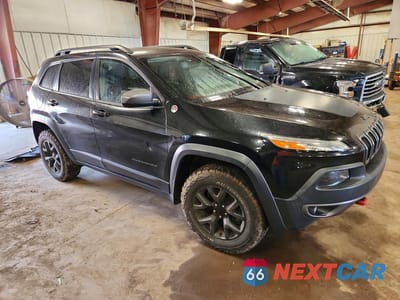 Czwarte zdjęcie samochodu z boku: 2016 JEEP CHEROKEE TRAILHAWK VIN:1C4PJMBSXGW109736 - miniatura