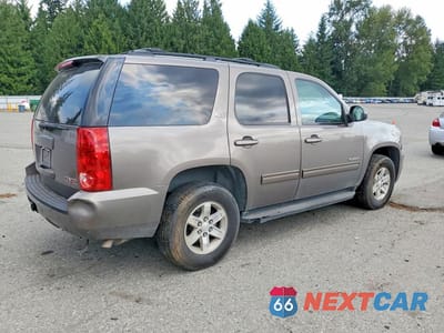Trzecie zdjęcie samochodu z tyłu: 2011 GMC YUKON SLT VIN:1GKS2CE01BR238178 - miniatura