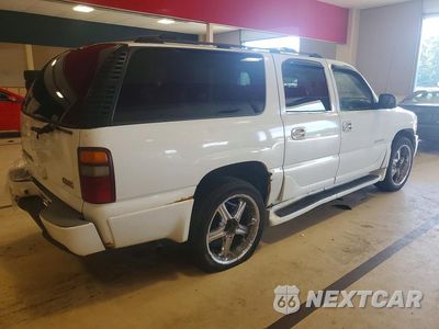 Trzecie zdjęcie samochodu z tyłu: 2002 GMC DENALI XL K1500 VIN:1GKFK66UX2J328979 - miniatura