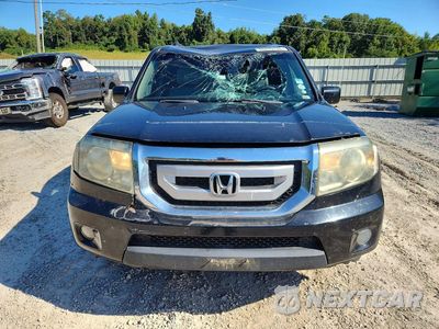 Piąte zdjęcie samochodu w środku: 2011 HONDA PILOT EX VIN:5FNYF4H45BB106741 - miniatura