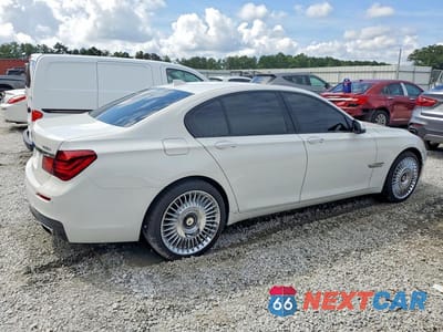 Trzecie zdjęcie samochodu z tyłu: 2015 BMW 750 I VIN:WBAYA8C57FD825375 - miniatura