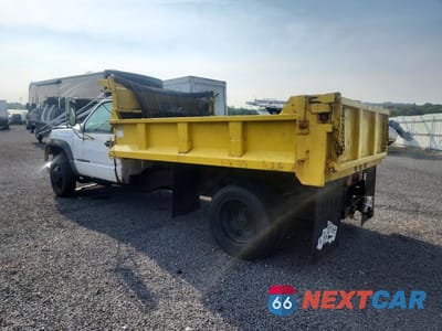 Drugie zdjęcie samochodu z przodu: 1999 GMC SIERRA DUMP TRUCK VIN:1GDKC34FXXF039004 - miniatura