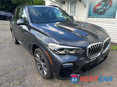 Czwarte zdjęcie samochodu z boku: 2021 BMW X5 XDRIVE45E VIN:5UXTA6C01M9F30456 - miniatura