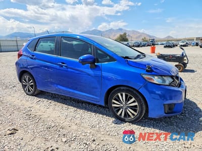 Czwarte zdjęcie samochodu z boku: 2017 HONDA FIT EX VIN:3HGGK5H73HM712617 - miniatura
