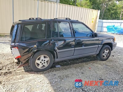 Trzecie zdjęcie samochodu z tyłu: 1994 JEEP GRAND CHEROKEE LAREDO VIN:1J4FX58S7RC283897 - miniatura