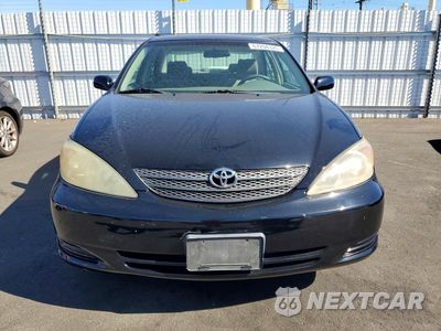 Piąte zdjęcie samochodu w środku: 2002 TOYOTA CAMRY LE VIN:JTDBE32K320056835 - miniatura