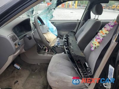Zdjęcie 7 z 12 samochodu: 2002 TOYOTA COROLLA CE VIN:2T1BR12EX2C527517 - miniatura