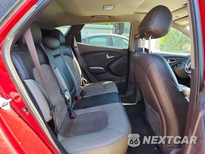 Zdjęcie 11 z 13 samochodu: 2010 HYUNDAI TUCSON GLS VIN:KM8JUCAC6AU042472 - miniatura