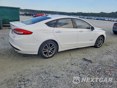 Trzecie zdjęcie samochodu z tyłu: 2017 FORD FUSION SE HYBRID VIN:3FA6P0LU0HR217182 - miniatura