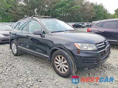 Czwarte zdjęcie samochodu z boku: 2011 VOLKSWAGEN TOUAREG V6 VIN:WVGFF9BP8BD001072 - miniatura