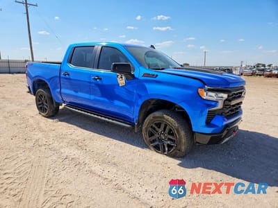 Czwarte zdjęcie samochodu z boku: 2025 CHEVROLET SILVERADO K1500 LT TRAIL BOSS VIN:3GCUKFEL6SG311965 - miniatura