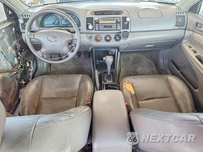 Zdjęcie 8 z 13 samochodu: 2003 TOYOTA CAMRY LE VIN:4T1BE32K73U182881 - miniatura