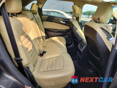 Zdjęcie 11 z 13 samochodu: 2015 FORD EDGE SEL VIN:2FMTK4J87FBC36263 - miniatura