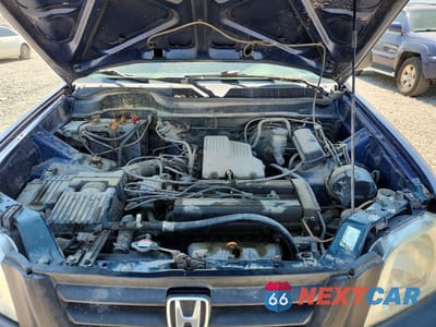 Zdjęcie 11 z 12 samochodu: 1999 HONDA CR-V LX VIN:JHLRD1849XC002544 - miniatura
