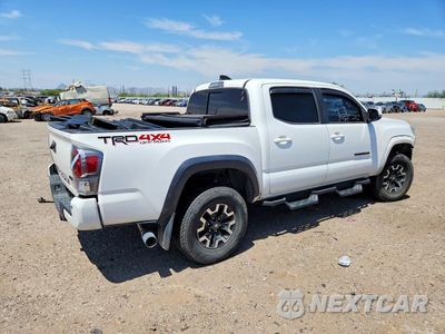 Trzecie zdjęcie samochodu z tyłu: 2021 TOYOTA TACOMA TRD OFF-ROAD VIN:5TFCZ5AN6MX269031 - miniatura