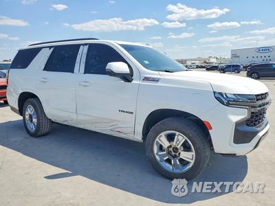 Czwarte zdjęcie samochodu z boku: 2022 CHEVROLET TAHOE K1500 Z71 VIN:1GNSKPKD0NR329030 - miniatura