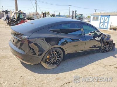 Trzecie zdjęcie samochodu z tyłu: 2021 TESLA MODEL 3 VIN:5YJ3E1EB8MF003606 - miniatura