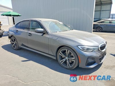 Czwarte zdjęcie samochodu z boku: 2020 BMW 330I VIN:3MW5R1J04L8B15627 - miniatura
