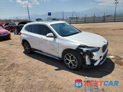 Czwarte zdjęcie samochodu z boku: 2018 BMW X1 XDRIVE28I VIN:WBXHT3C38J5L25889 - miniatura