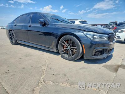 Czwarte zdjęcie samochodu z boku: 2019 BMW 750 XI VIN:WBA7F2C51KB239416 - miniatura