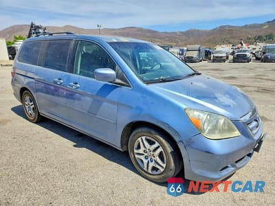 Czwarte zdjęcie samochodu z boku: 2007 HONDA ODYSSEY EXL VIN:5FNRL38607B108932 - miniatura