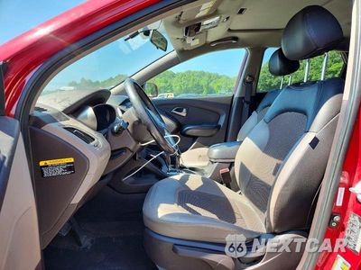 Zdjęcie 7 z 13 samochodu: 2010 HYUNDAI TUCSON GLS VIN:KM8JUCAC6AU042472 - miniatura