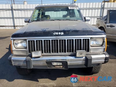 Piąte zdjęcie samochodu w środku: 1990 JEEP CHEROKEE LAREDO VIN:1J4FJ57L0LL286627 - miniatura