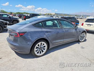 Trzecie zdjęcie samochodu z tyłu: 2022 TESLA MODEL 3 VIN:5YJ3E1EB5NF110050 - miniatura