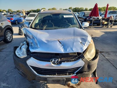 Piąte zdjęcie samochodu w środku: 2011 HYUNDAI TUCSON LIMITED VIN:KM8JU3AC4BU138151 - miniatura
