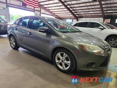Czwarte zdjęcie samochodu z boku: 2014 FORD FOCUS SE VIN:1FADP3F20EL454719 - miniatura