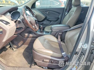Zdjęcie 7 z 13 samochodu: 2014 HYUNDAI TUCSON LIMITED VIN:KM8JU3AGXEU877662 - miniatura