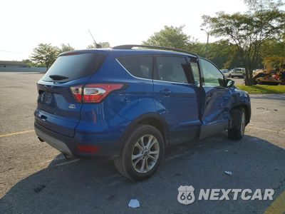 Trzecie zdjęcie samochodu z tyłu: 2018 FORD ESCAPE SEL VIN:1FMCU9HD0JUD53888 - miniatura
