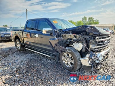 Czwarte zdjęcie samochodu z boku: 2022 FORD F150 SUPERCREW VIN:1FTFW1E58NFA06975 - miniatura