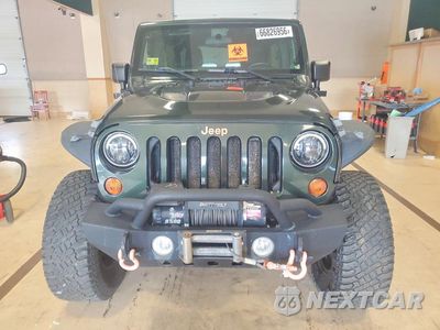 Piąte zdjęcie samochodu w środku: 2011 JEEP WRANGLER UNLIMITED SPORT VIN:1J4BA3H19BL624136 - miniatura