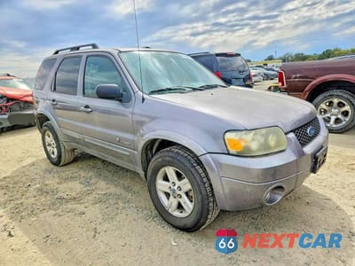 Czwarte zdjęcie samochodu z boku: 2007 FORD ESCAPE HEV VIN:1FMCU49H77KA91635 - miniatura